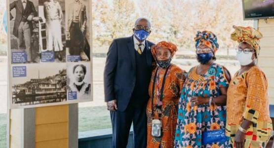 Dr. Pollard pauses for a photo opportunity with descendants of one of Oakwood's first students, Mary McBee (pictured at lower right of poster), (L-R) Dr. Pollard, Ms. Deborah Young, Ms. Hadassah Young Davis, and Ms. Judith Young.We were honored by the presence of Dr. Charles E. Bradford (2nd from left) and his daughter Mrs. Sharon Lewis during the celebration today. Dr. Bradford is the son Etta Littlejohn Bradford, one of Oakwood's original 16 students. Dr. Pollard pauses for a photo opportunity with descendants of one of Oakwood's first students, Mary McBee (pictured at lower right of poster), (L-R) Dr. Pollard, Ms. Deborah Young, Ms. Hadassah Young Davis, and Ms. Judith Young.