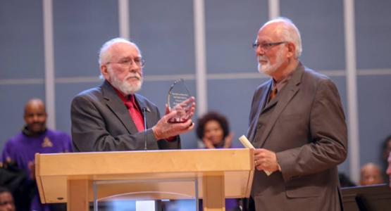 Erwin Mack present the Caring Heart Award to Ken Flemmer Erwin Mack present the Caring Heart Award to Ken Flemmer