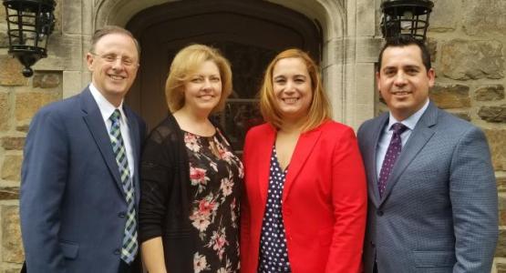 Gary Gibbs and his wife, Sherilyn, welcome Carlos and Liz Charnichart to the Pennsylvania Conference team. Gary Gibbs and his wife, Sherilyn, welcome Carlos and Liz Charnichart to the Pennsylvania Conference team.