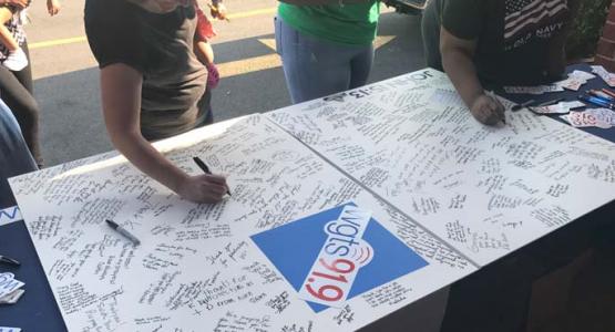 WGTS listeners sign a card for capitol police WGTS listeners sign a card for capitol police