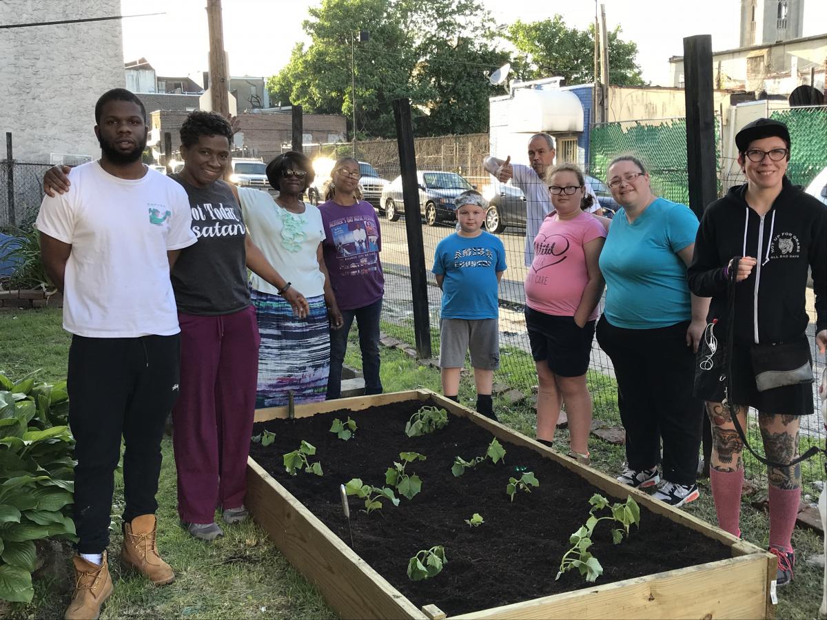 Allegheny East Conference's Mizpah church in Philadelpha provides a weekly grocery distribution, clothing and shoe ministries and a garden for community members (some pictured.)