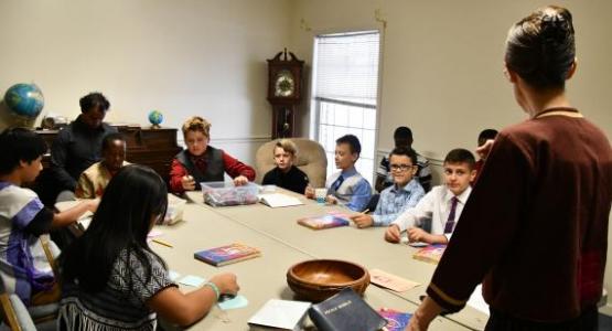 Terri Saelee, North American Division coordinator for Adventist Refugee and Immigrant Ministries, shares a "Loss Simulation' exercise with the Junior/Earliteen class. Terri Saelee, North American Division coordinator for Adventist Refugee and Immigrant Ministries, shares a "Loss Simulation' exercise with the Junior/Earliteen class.